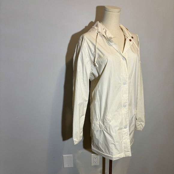 Levi's Jackets & Blazers - Levi's Rain Jacket, packable, Cream with Rose Gold, SZ M, Like new